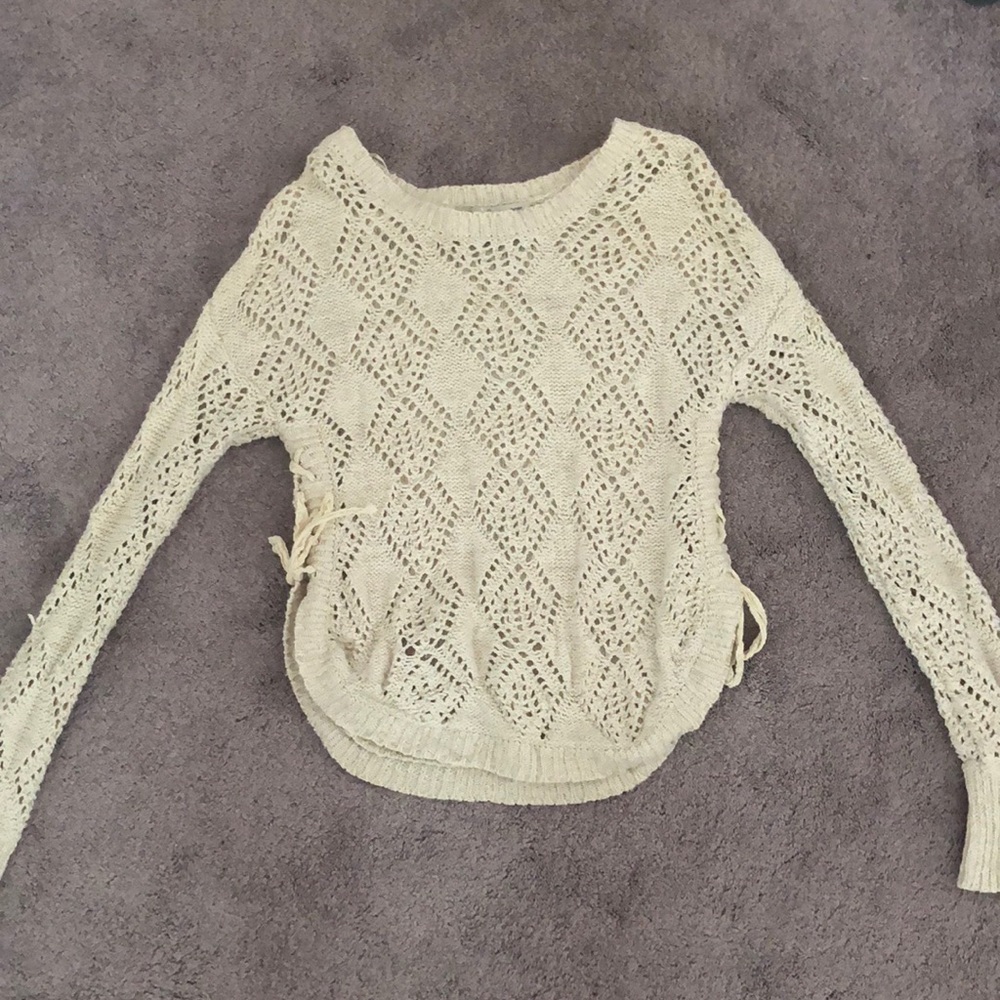 Sweater with side ties